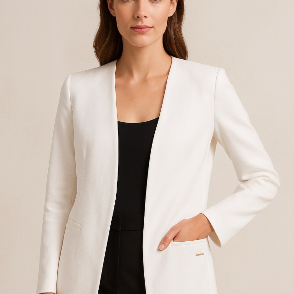 Sleek and sophisticated Calvin Klein women’s blazer in crisp white.